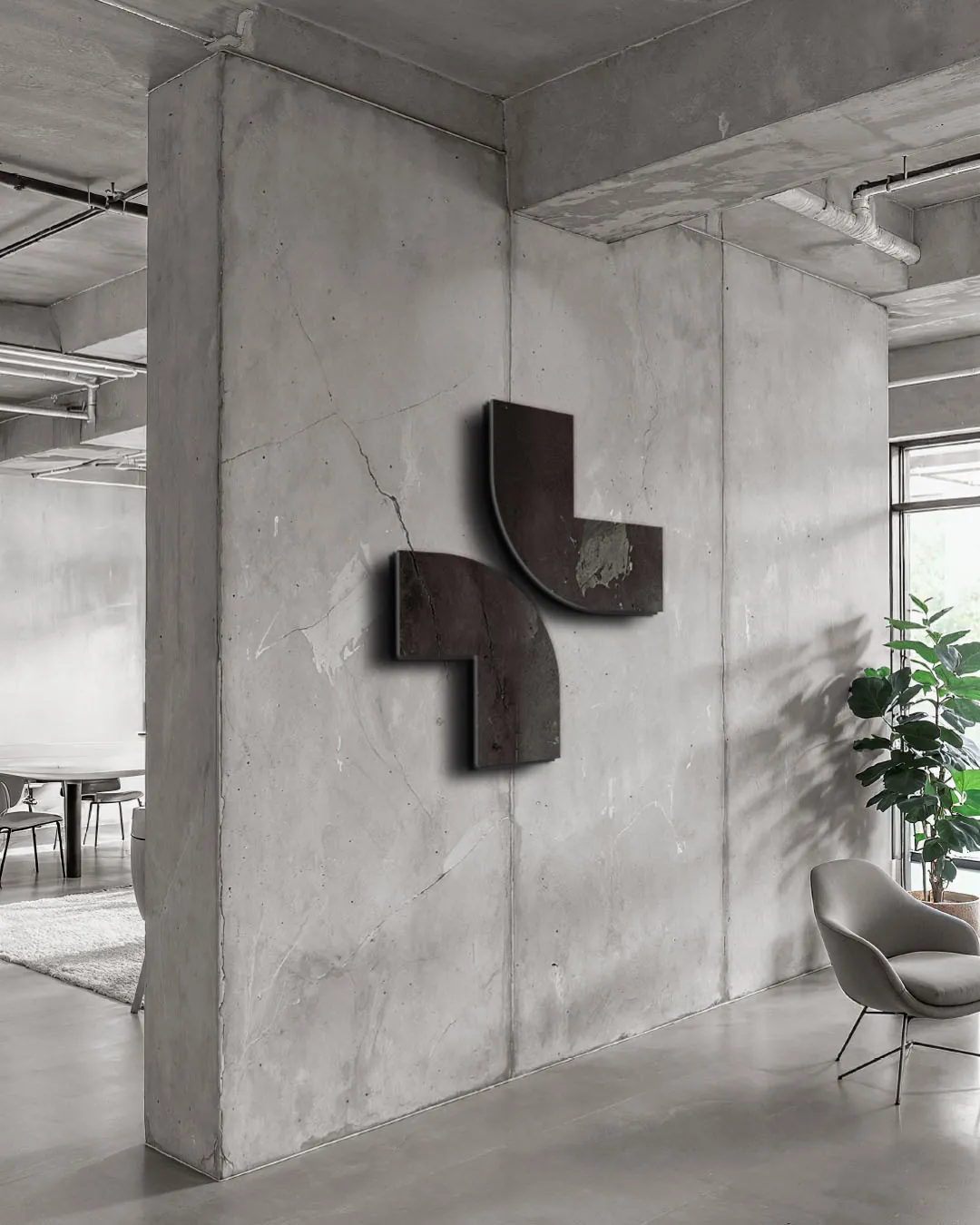 DETECH – logotyp na stene showroomu